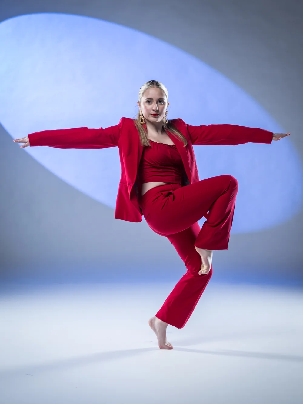 Turned-out balance, red suit